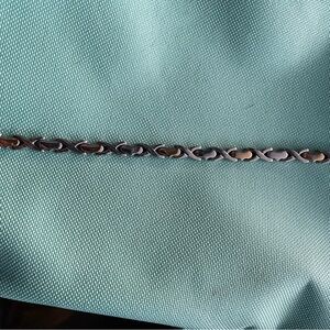Silver toned XO bracelet I believe to be 7” perfect for Valentine’s Day
